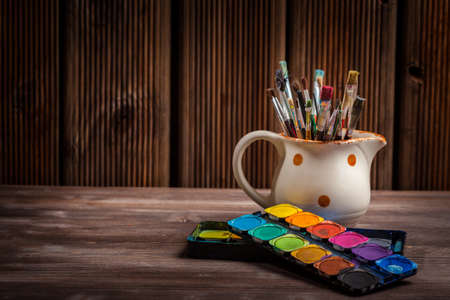 Different used brushes, colours and watercoloursの写真素材