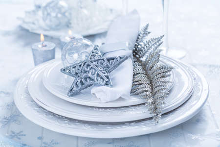 Decorated Christmas tablein blue toneの写真素材