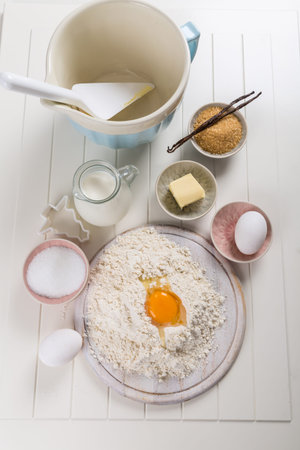 Baking utensils with ingredients for cake or cookies