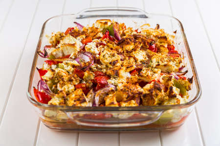 Baked vegetables with feta cheese in the panの写真素材