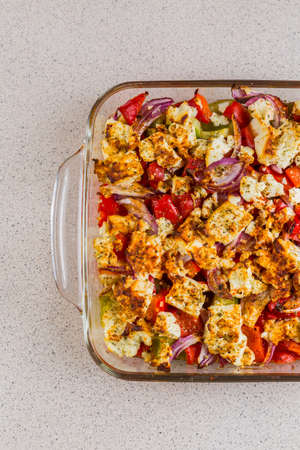 Baked vegetables with feta cheese in the panの写真素材