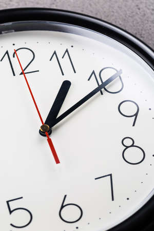 Turn back time - concept of turning clock backwardsの写真素材