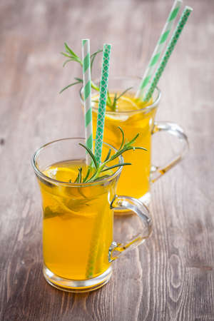 Rosemary and lemon lemonade. Summer fresh ice teaの写真素材