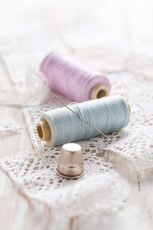 Assortment of sewing accessories on white background. Concept of handcraft.の写真素材