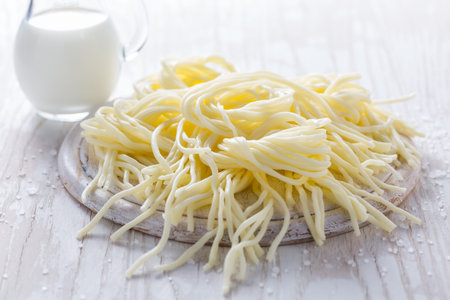 String cheese or cheese whip (korbaciky) - salty snack cheese, national delicacy from Slovakia. Made...