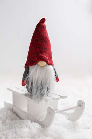 Christmas imp on sleigh with snowy landscape. Christmas decoration.の写真素材
