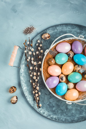 Painted Easter eggs with pussy willow branch.