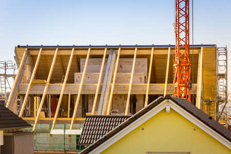 Roof construction - Industrial roof system with wooden timber.の写真素材
