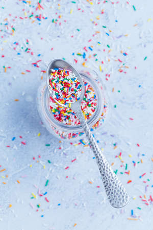 Colorful sugar sprinkles for baking in icy tone - baking conceptの写真素材