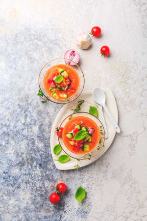 Homemade Spanisch Gazpacho - cold vegetable soup with ingredients, refreshing and coolの写真素材