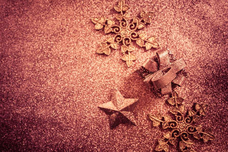 Christmas glitter background with ornaments and present box with copy spaceの写真素材
