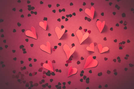 Red paper hearts with confetti Valentine. Happy Valentineの写真素材
