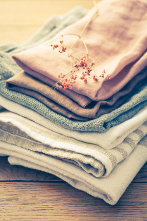 Concept of sustainability - fabric made from natural materials such as cotton and linen on wooden backgroundの写真素材