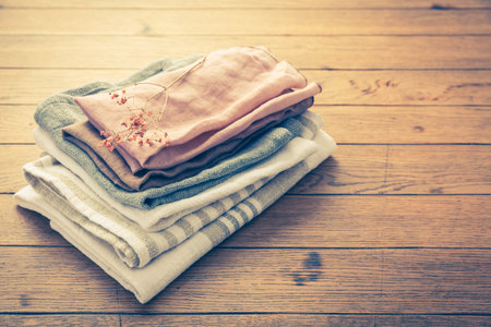 Concept of sustainability - fabric made from natural materials such as cotton and linen on wooden backgroundの写真素材