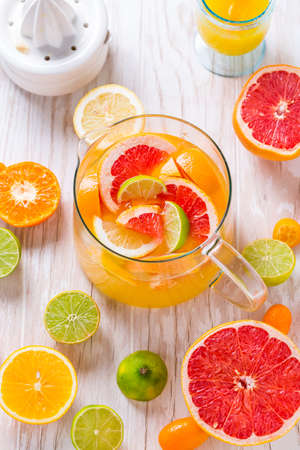 Citrus lemonade or ice tea. Drink with fresh lemons and oranges. Lemon cocktail with juice and iceの写真素材