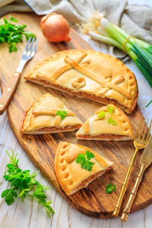 Empanada Gallega - traditional pie stuffed with tuna, Galician and Spanish cuisine. Tart with tuna and vegetables.の写真素材