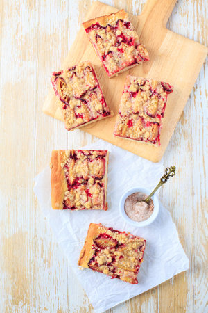 German plum cake (Zwetschgenkuchen) with  yeast dough and crumbles