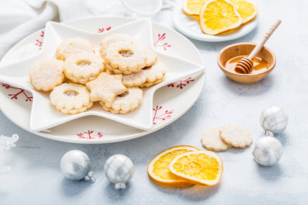 Homemade Christmas cookies with orange and honey. Christmas decoration with ornaments.の写真素材