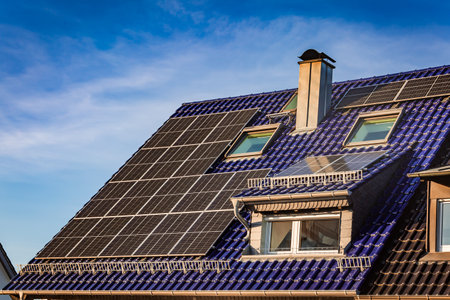 Photovoltaic panels on a roof of a family house, solar systemの写真素材