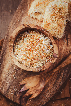 Butter roasted Kadayif pastry, fine dough threads for delicious sweet desserts, Turkish cuisineの写真素材