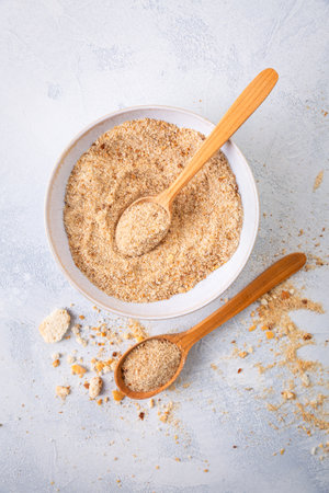 Making homemade panko and breadcrumbs from leftover bread and buns, zero waste conceptの写真素材