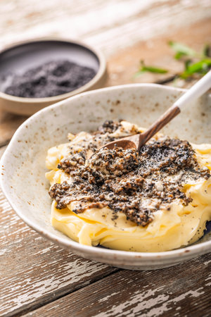 Homemade truffle butter with olive oil and black saltの写真素材