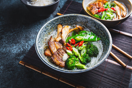 Ramen soup with mushrooms, vegetables, and pork