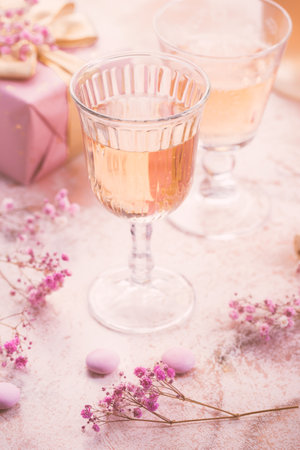 Rose sparkling wine, French macarons and box of chocolates for Valentine's Day, mother's day or birthdayの写真素材