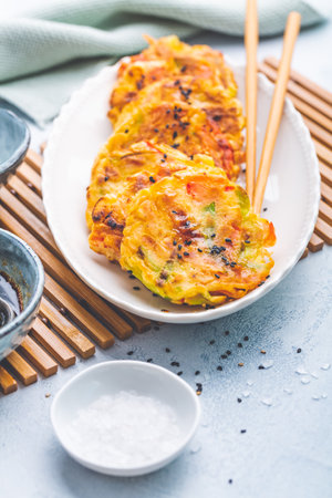 Korean vegetable pancakes with dipping sauce, Korean pizza - Asian food styleの写真素材