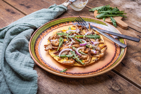 Vegetarian fritta with mushrooms, onions and arugulaの写真素材