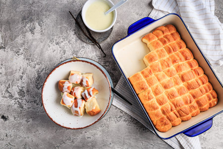 Buchteln, sweet rolls made of yeast dough with milk and butter, served with vanilla sauce....