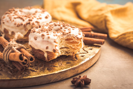 Cinnamon cronuts, delicious pastry that combines a croissant and a donutの写真素材