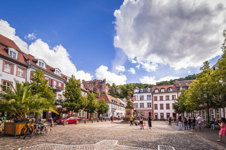 Karlsplatz in historical town Heidelberg with view on castle ruin, Germanyのeditorial素材
