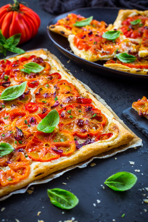Tomato tart made with puff pastry, healthy vegetarian foodの写真素材