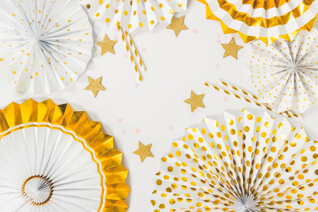 Party  background with paper fans, party decoration, party celebration in white and golden toneの写真素材