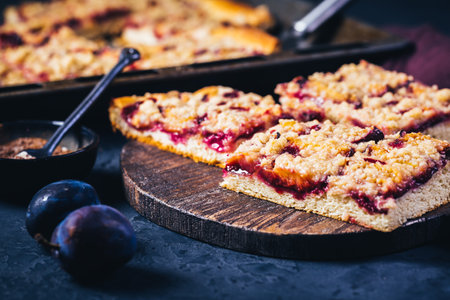 German plum cake (Zwetschgenkuchen) with  yeast dough and crumblesの写真素材
