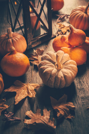 Thanksgiving and Halloween concept. Pumpkins and autumn leaves.の写真素材