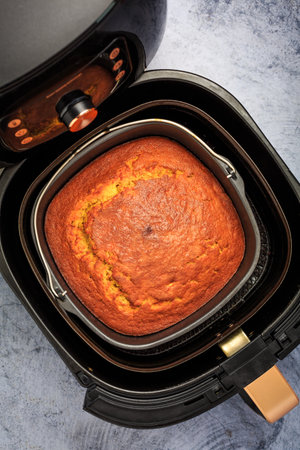 Cooking and baking in airfryer - homemade pumpkin apple cakeの写真素材