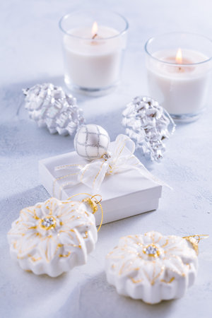 Christmas ornaments in snowy white.   Merry Christmas and Happy Holidays greeting cardの写真素材