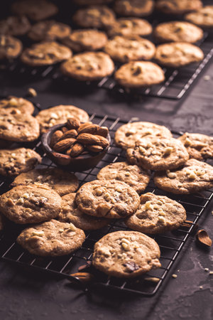 Homemade healthy almond cookies with chocolate chips on black backgroundの写真素材