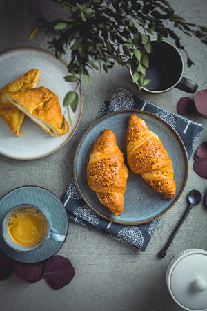 Breakfast - cup of coffee, croissants and curd cheese turnover.の写真素材