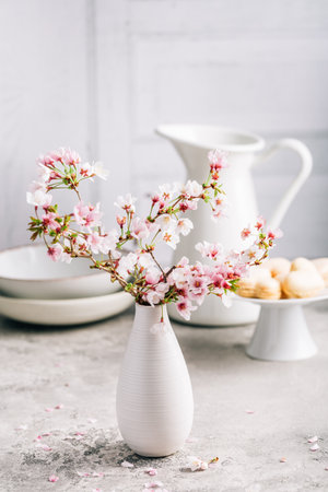 Spring feeling - cherry blossom branch with sweet macarons for Mothers Dayの写真素材