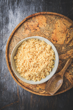 Freshly cooked bulgur in bowl. Bulgur wheat grains.の写真素材