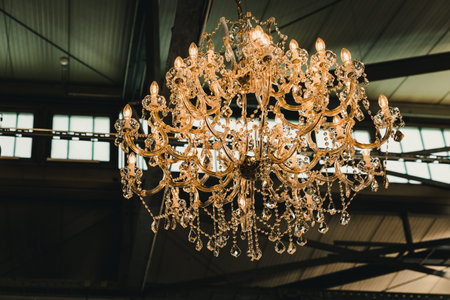 Chrystal chandelier in a industry hallの写真素材