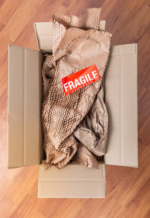 Delivery and mail service, people and shipment concept - fragile mark in parcel boxの写真素材