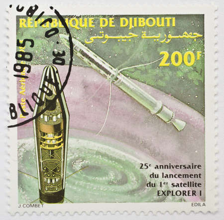DJIBOUTI - CIRCA 1983  A stamp from Djibouti shows image commemorating the 25th anniversary of Explorer 1, the first Earth satellite of the United States, circa 1983 のeditorial素材