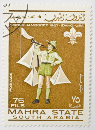 Stamp from Mahra Sultanate  now Yemen  shows image of a Scout and celebrates the World Jamboree, circa 1967 のeditorial素材
