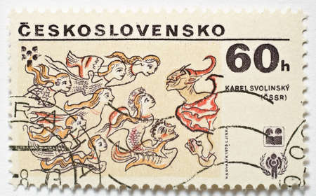Vintage Czech Postage Stamp shows artwork by Karel Svolinsky of mermaids and the Devil, circa 1979 のeditorial素材