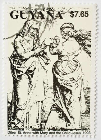  GUYANA - CIRCA 1993  a stamp from Guyana show image of St Anne with Mary and Jesus, circa 1993 のeditorial素材