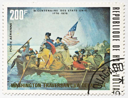  UPPER VOLTA - CIRCA 1976  a stamp from Upper Volta  present day Burkina Faso  shows image of George Washington crossing the Delaware River and commemorates the US bicentennial, circa 1976 のeditorial素材